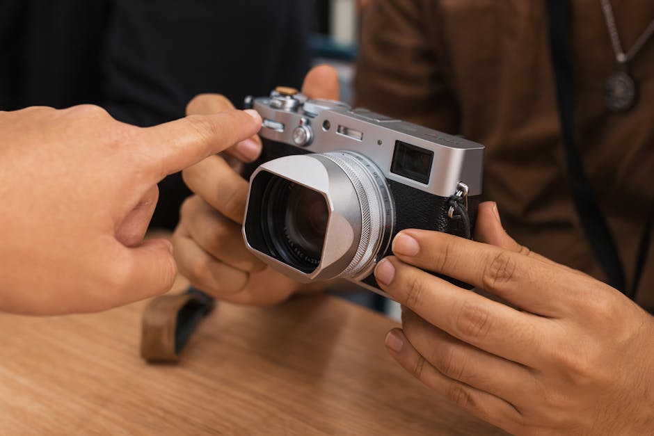 Beginner photographer kneeling with mirrorless camera at golden hour, demonstrating aperture-priority shooting and using the rule-of-thirds grid overlay on camera