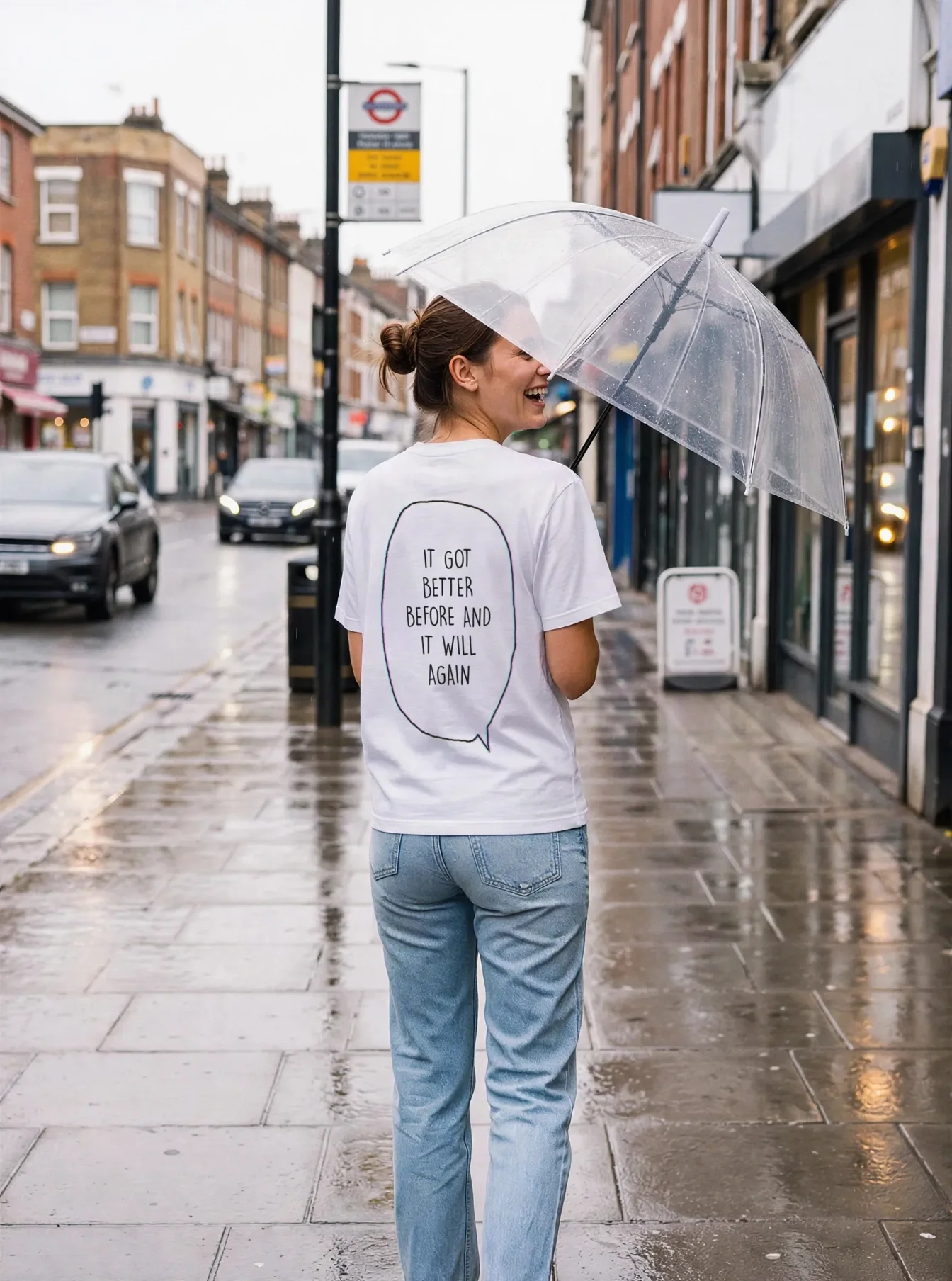 "it got better before and it will again" Backprint Tee worn by a model