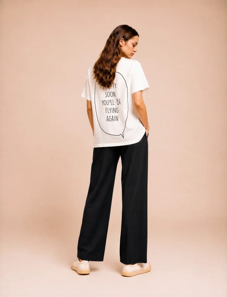 "pretty soon, you'll be flying again" Backprint Tee, back view, Its.That.