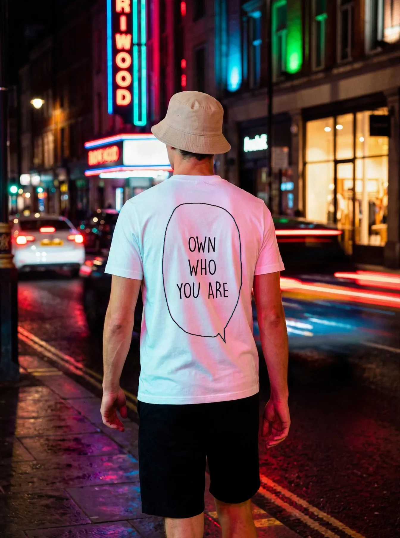 "Own who you are" Backprint Tee worn by a model