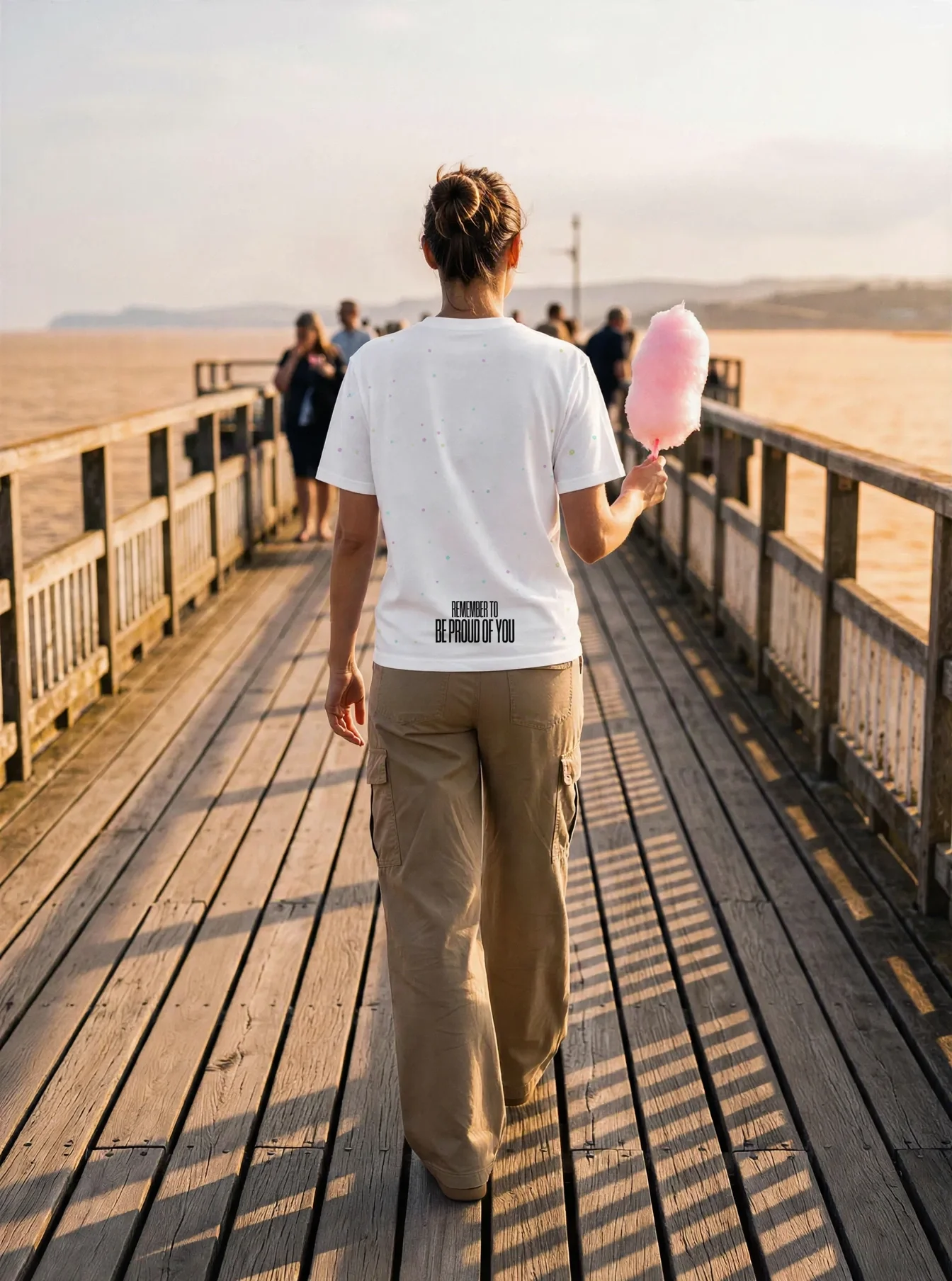 "Be proud of you" Backprint Tee worn by a model
