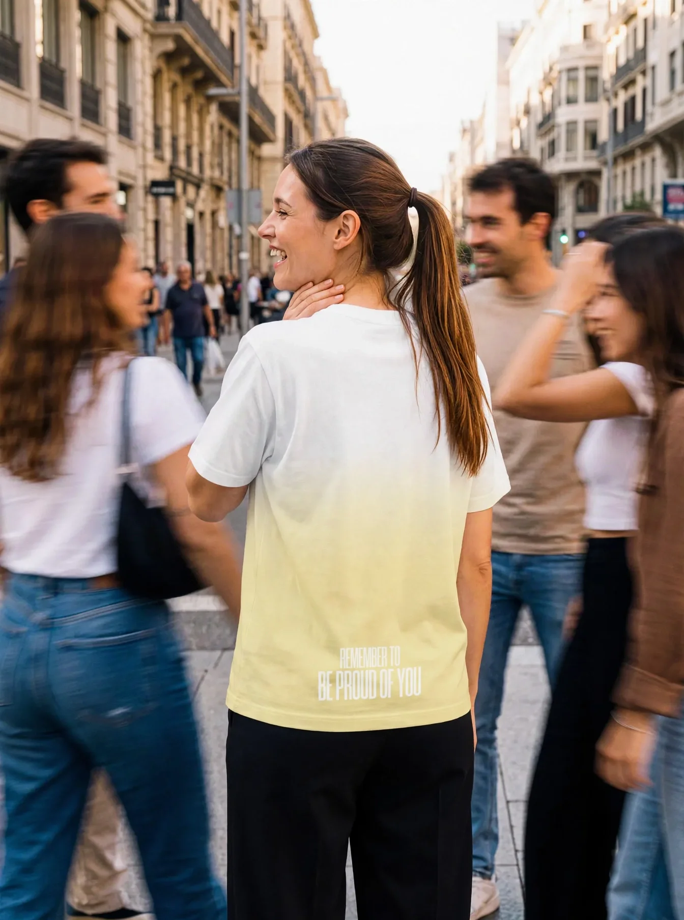 "Be proud of you" Backprint Tee worn by a model