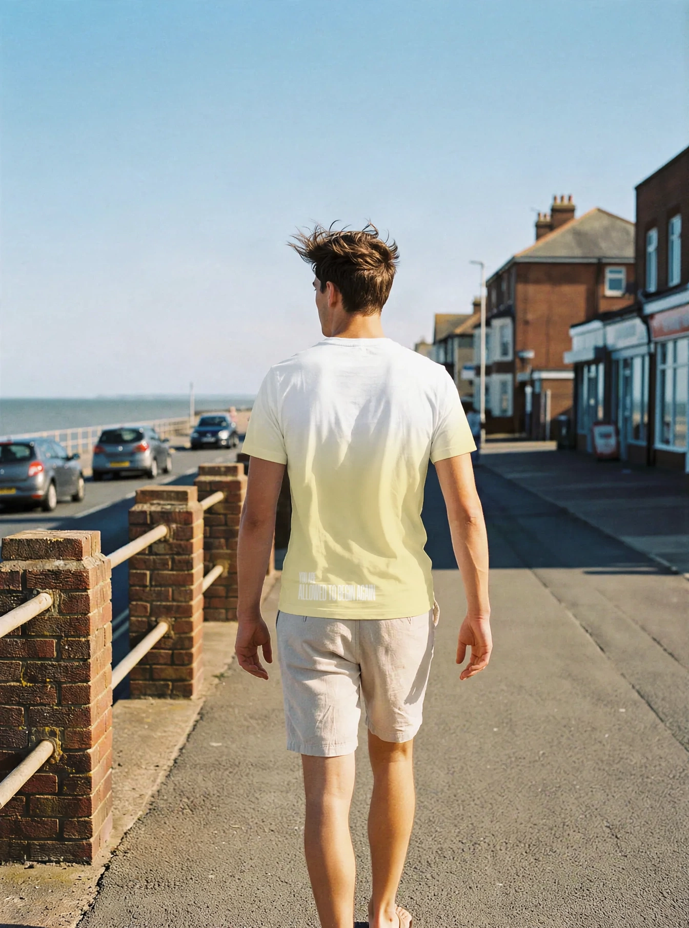 "You're allowed to begin again" Backprint Tee, on model