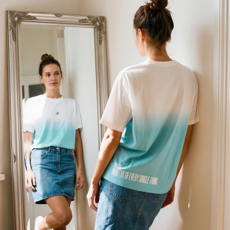 "you are worthy of every single thing." Backprint Tee worn by a model