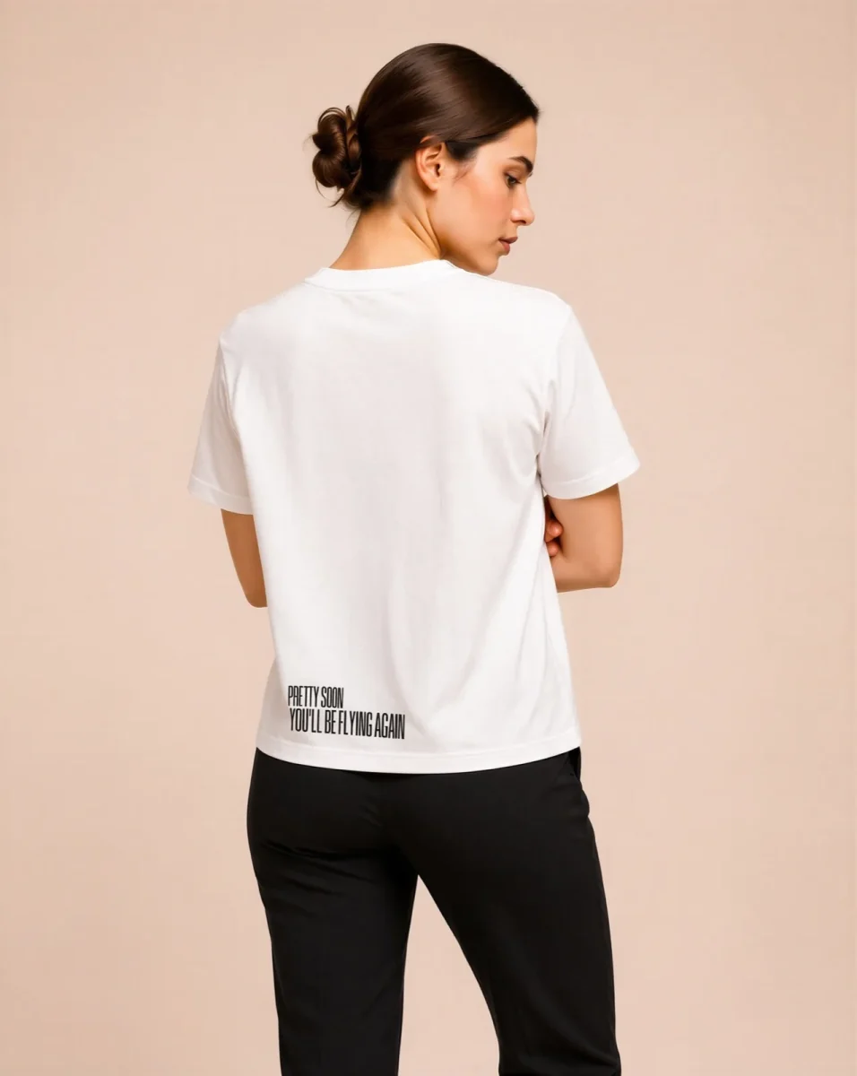 "pretty soon, you'll be flying again" Backprint Tee, back view, Its.That.