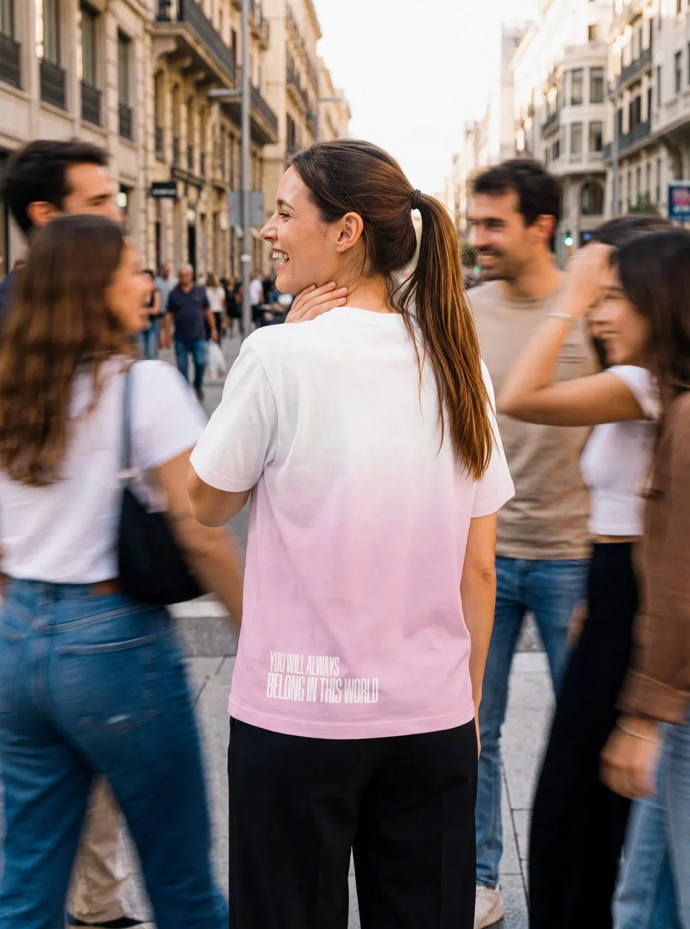 "YOU BELONG IN THIS WORLD" Backprint Tee worn by a model