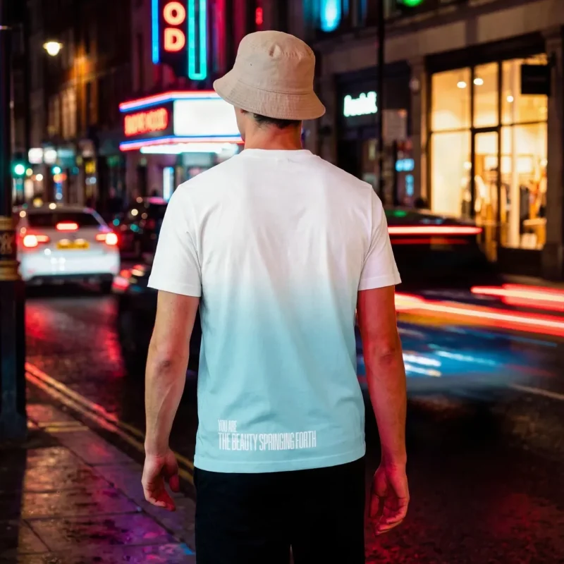 "MAY BEAUTIFUL NEW THINGS SPRING FORTH" Backprint Tee worn by a model