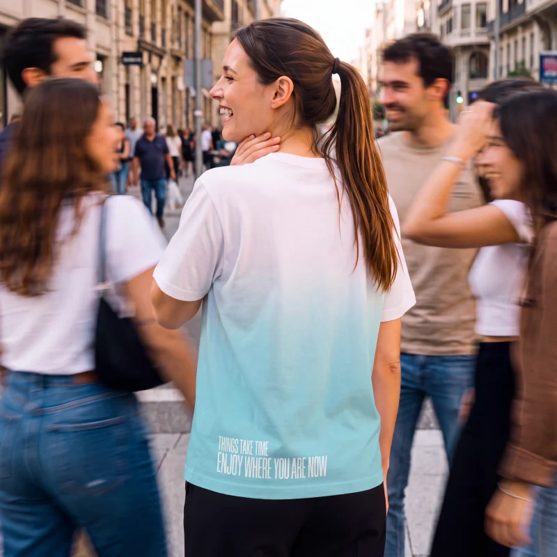 "enjoy where you are now" Backprint Tee worn by a model