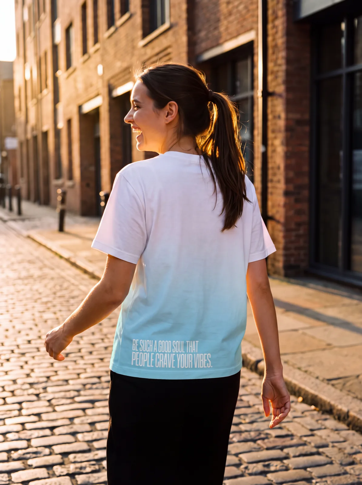 "Be such a good soul that people crave your vibes." Backprint Tee, on model