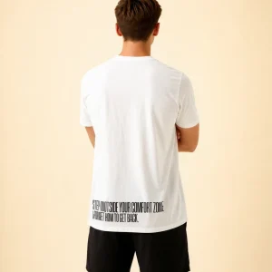 "Step outside your comfort zone & forget how to get back." Backprint Tee, back view, Its.That.