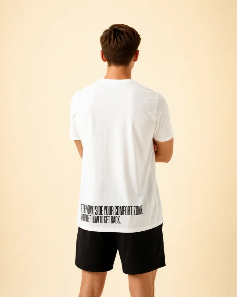 "Step outside your comfort zone & forget how to get back." Backprint Tee, back view, Its.That.