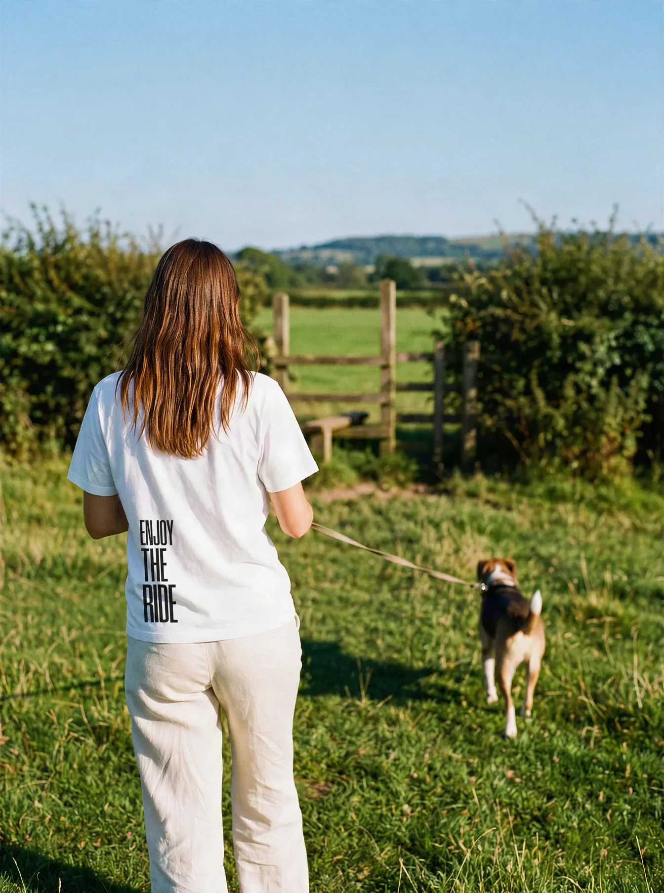 "ENJOY THE RIDE" Backprint Tee worn by a model